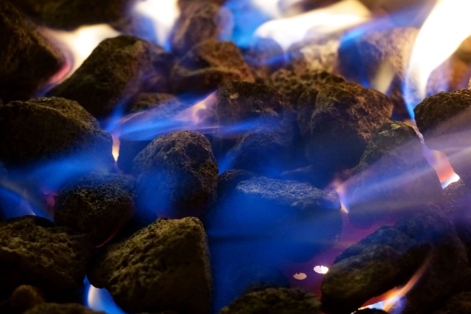 Glowing coconut charcoal briquettes